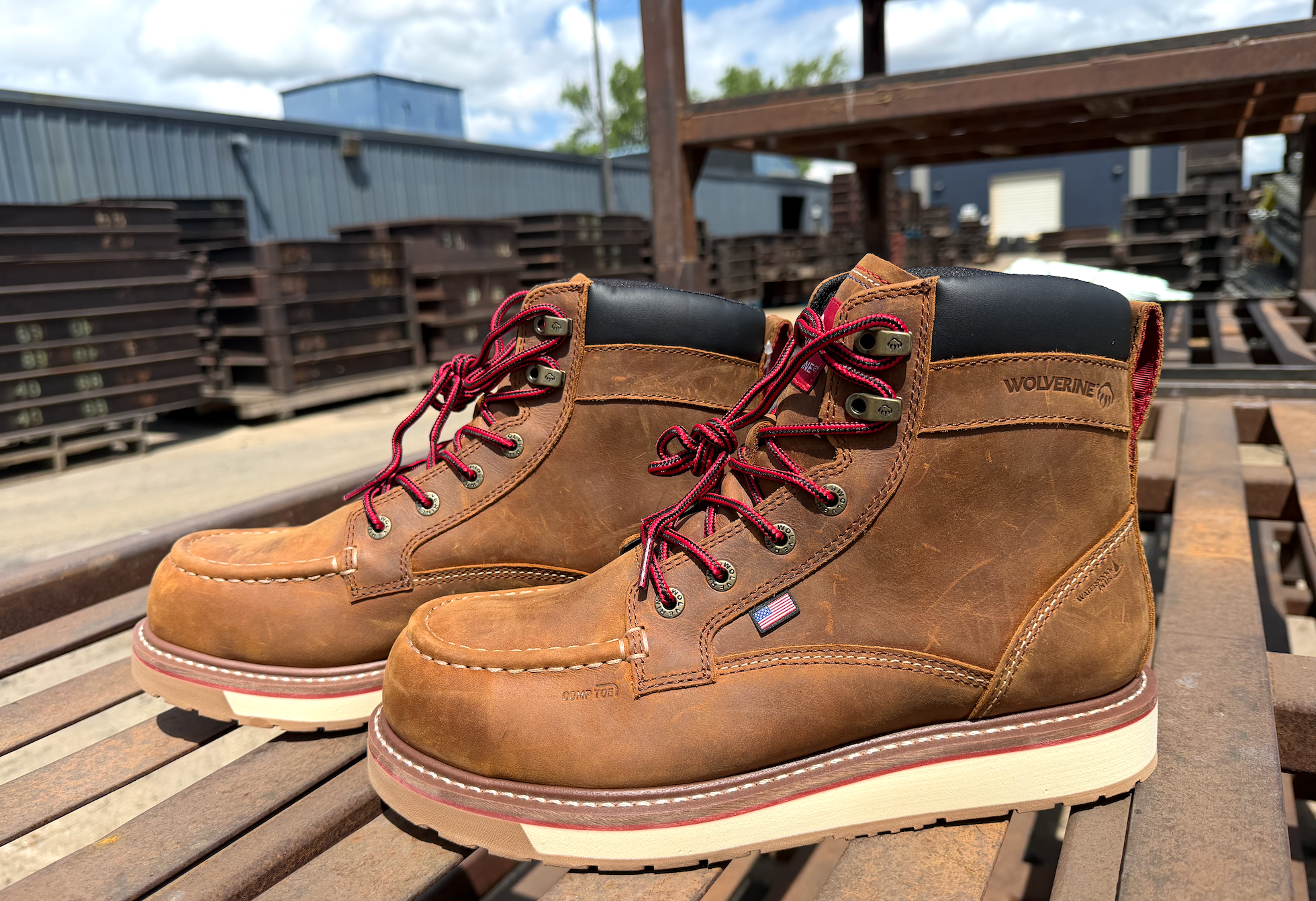 Kory Anderson wearing Wolverine boots while working in the foundry or around the 150 Case steam engine